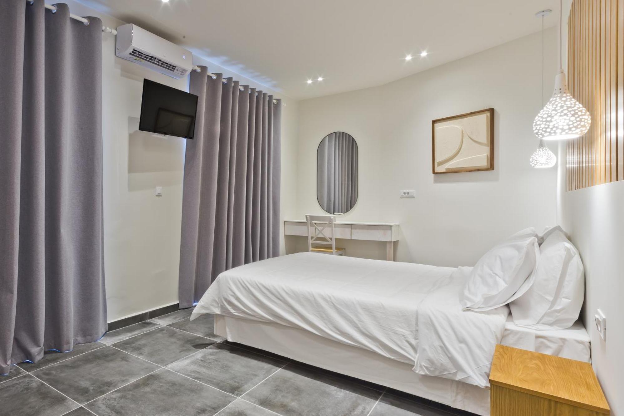 Posidonia Luxury Suites Karpathos Bagian luar foto